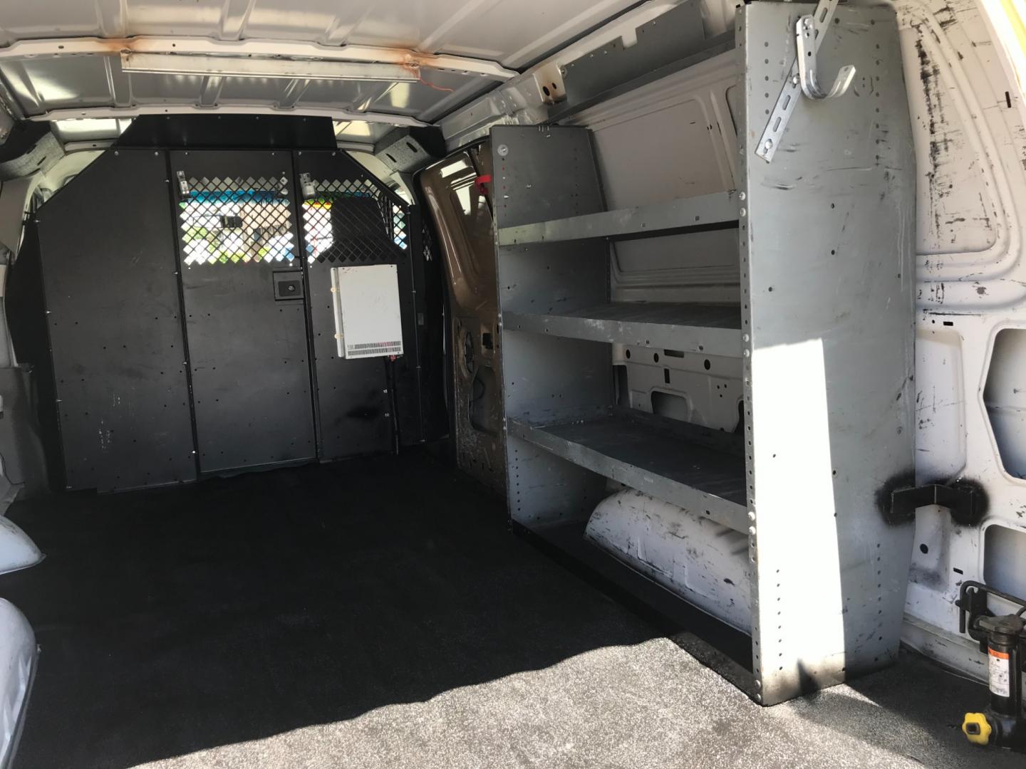 2011 Tan /Gray Ford E-Series Van E250 (1FTNE2EW5BD) with an 4.8 V8 engine, Automatic transmission, located at 577 Chester Pike, Prospect Park, PA, 19076, (610) 237-1015, 39.886154, -75.302338 - 2011 Ford E250 Cargo Van: Ladder racks, shelving, heavy duty partition, power inverter, fully metal body, FLEET MAINTAINED, runs LIKE NEW! This vehicle comes inspected and has been given a bumper to bumper safety check. It is very clean, reliable, and well maintained. We offer a unique pay plan t - Photo#17